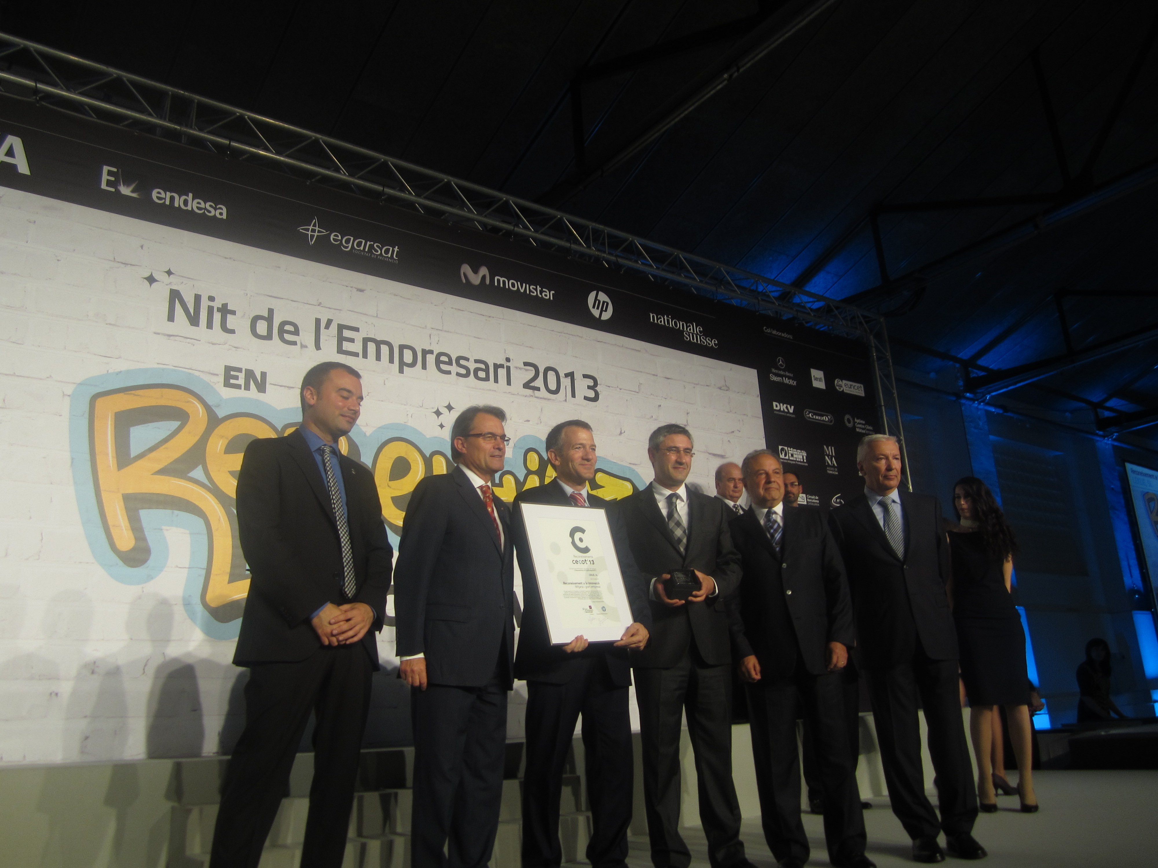 Antoni Abad y Artur Mas con los premiados