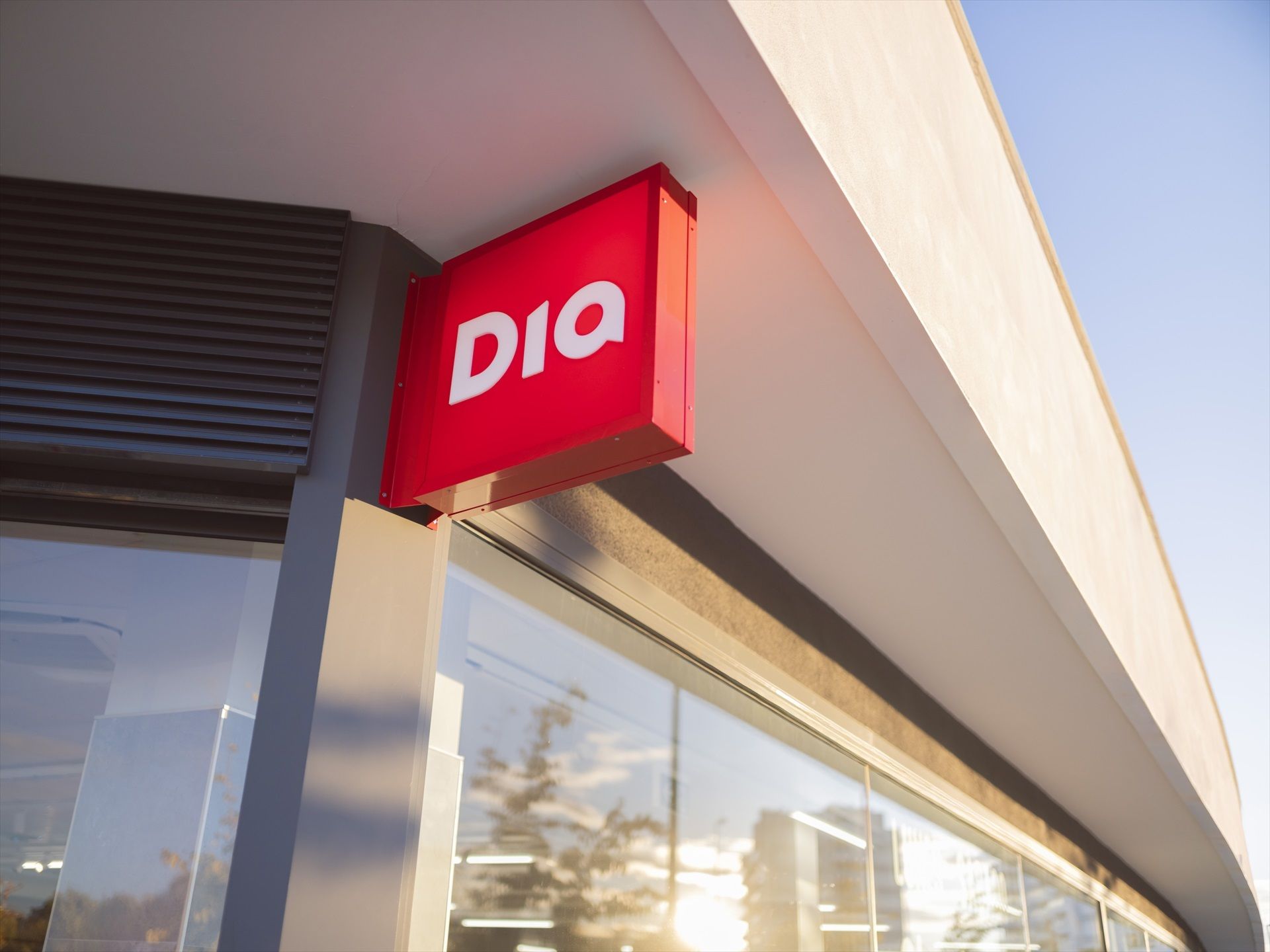 El logotip de Dia imprès en un cartell | Europa Press